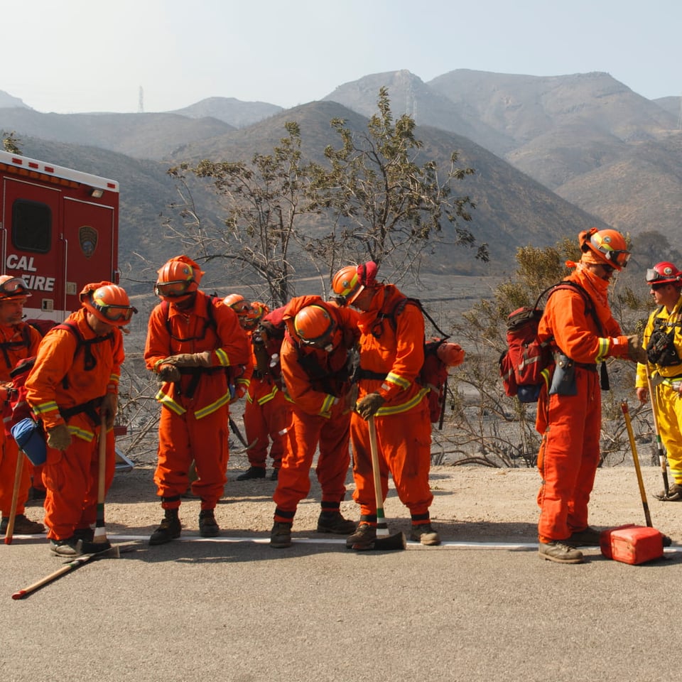 group of wildlands firefighters on road (Cropped) - opt